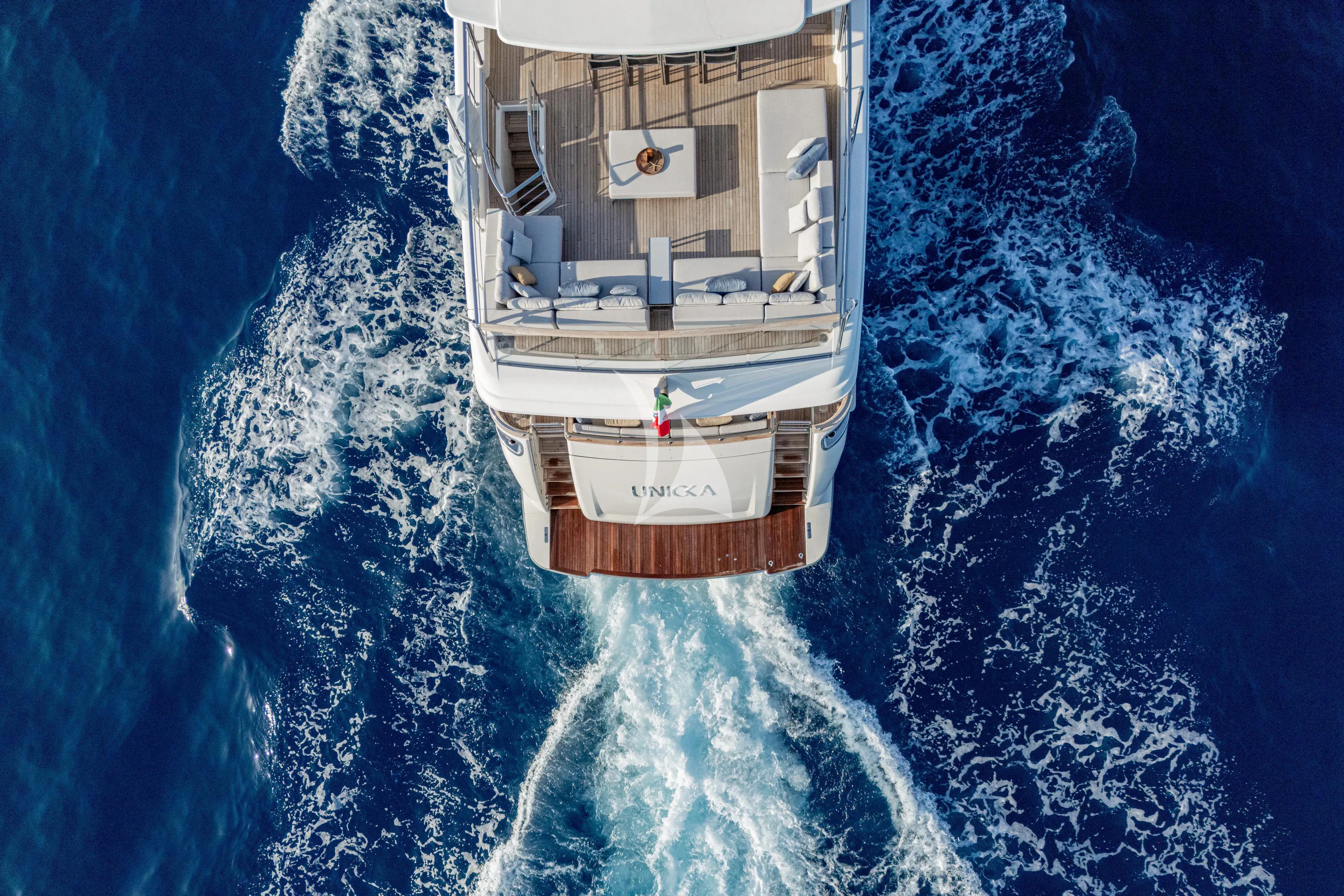 a small island with a house on it aboard UNICKA Yacht for Sale