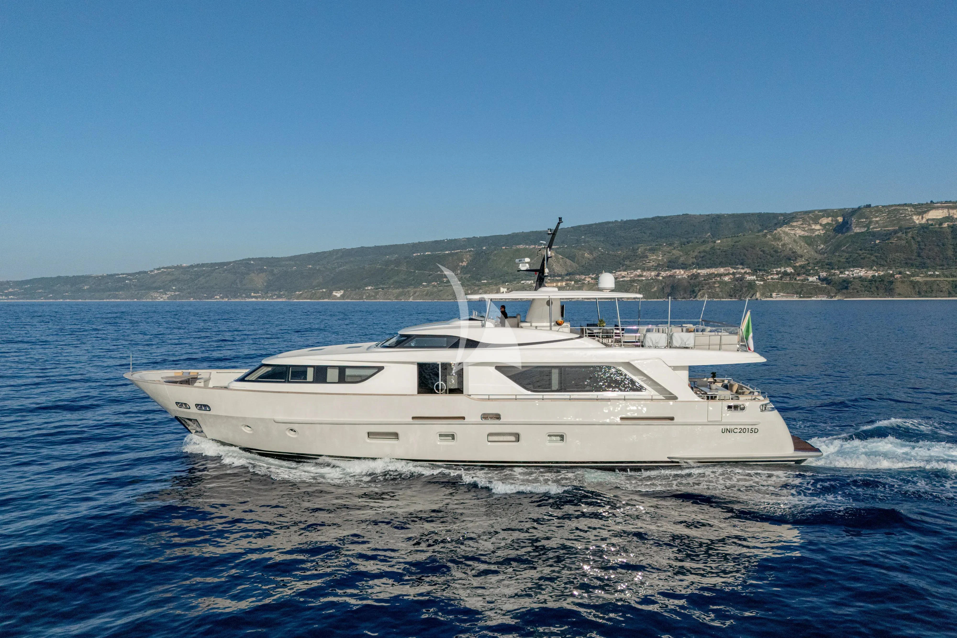a white yacht in the water aboard UNICKA Yacht for Sale