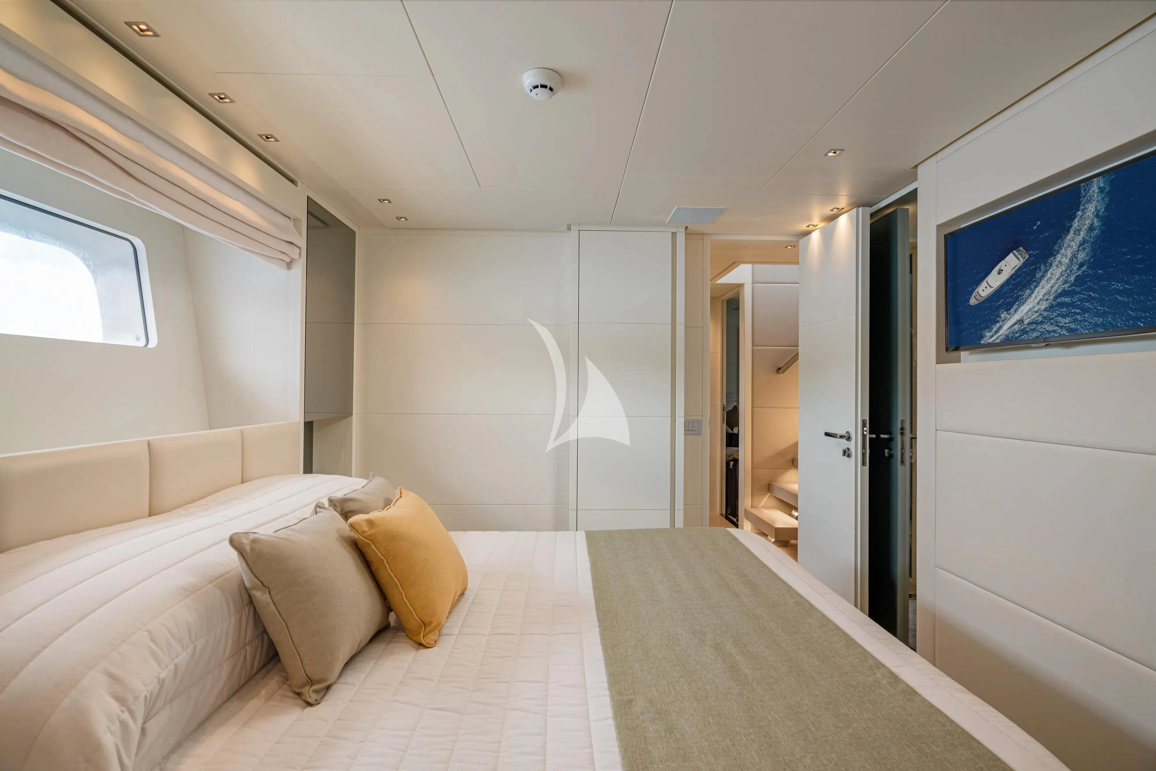 a bed in a room aboard UNICKA Yacht for Sale