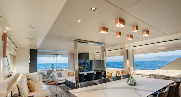 a large modern room with a large open window aboard UNICKA Yacht for Sale