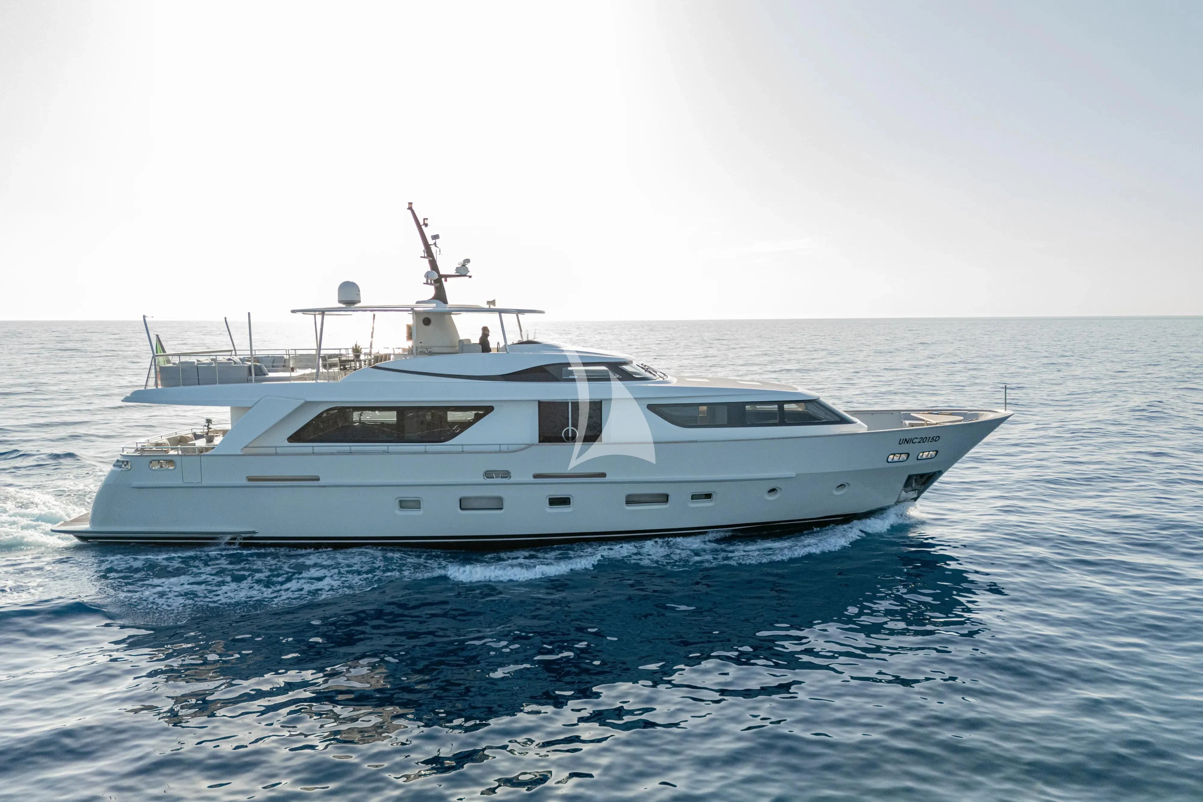 a white yacht in the water aboard UNICKA Yacht for Sale