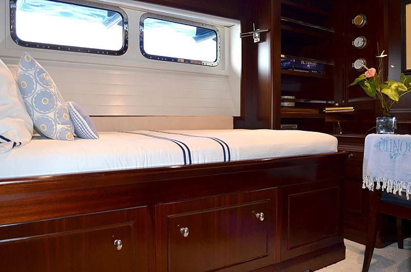 a bed in a room aboard LA BELLE Yacht for Sale