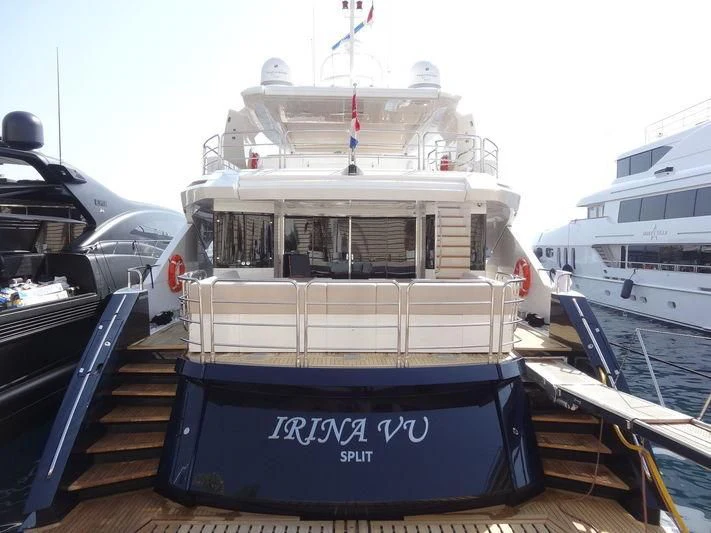 a boat docked at a pier aboard IRINA VU Yacht for Sale
