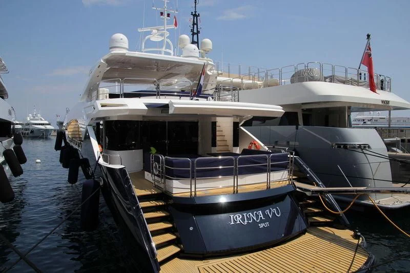 a boat docked at a pier aboard IRINA VU Yacht for Sale