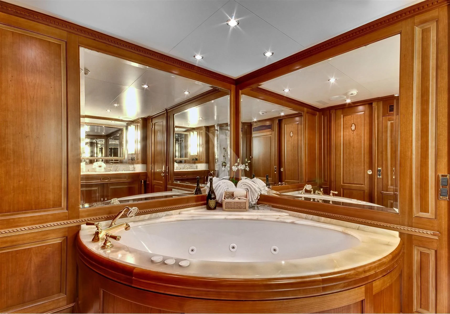 a bathroom with a large mirror aboard KEIKI KAI Yacht for Sale