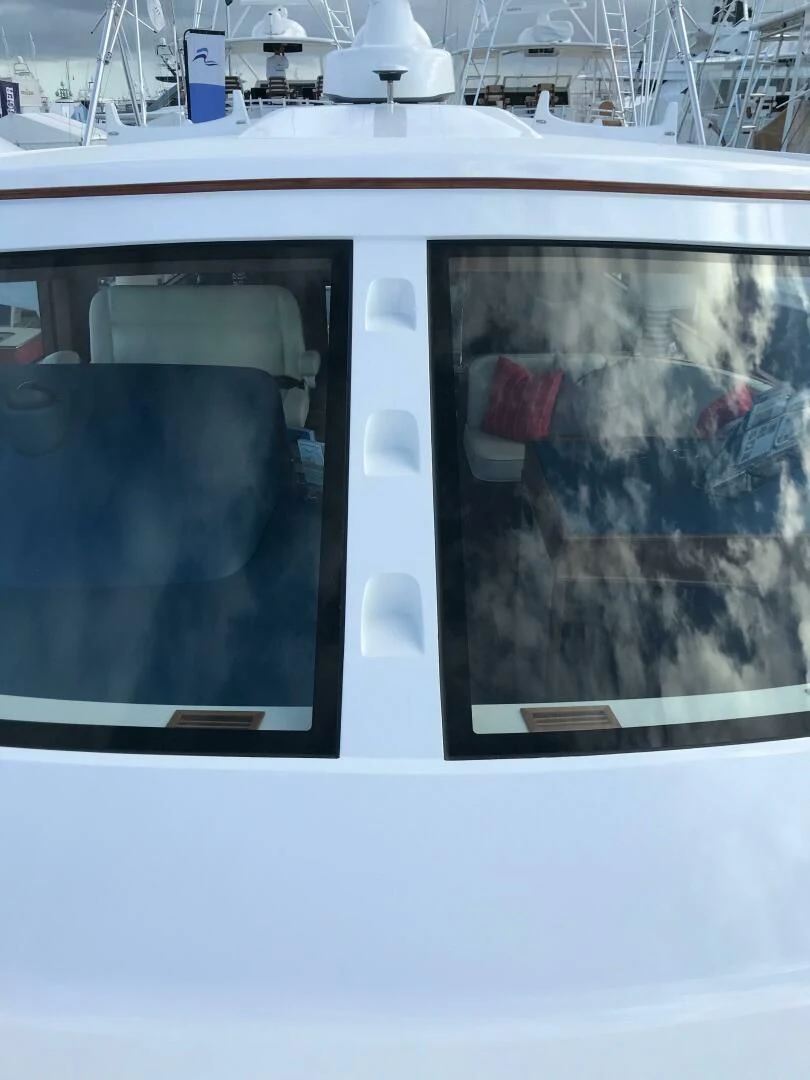 a window with a picture of a dog on it aboard PRIVATEER Yacht for Sale