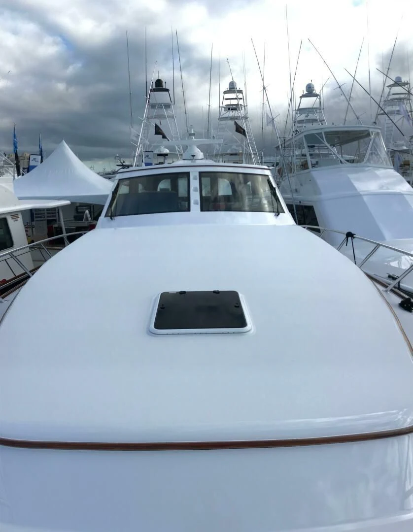 a boat parked in a harbor aboard PRIVATEER Yacht for Sale