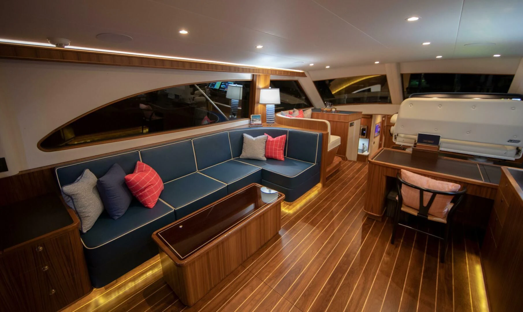 a large living room with a couch aboard PRIVATEER Yacht for Sale