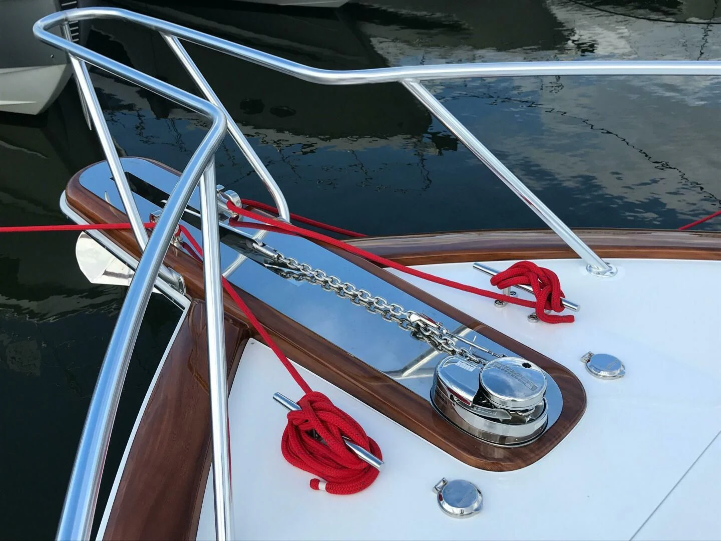 a boat with a red steering wheel aboard PRIVATEER Yacht for Sale