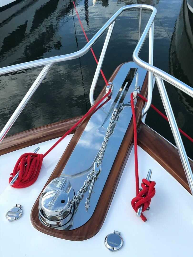 a red and white boat aboard PRIVATEER Yacht for Sale