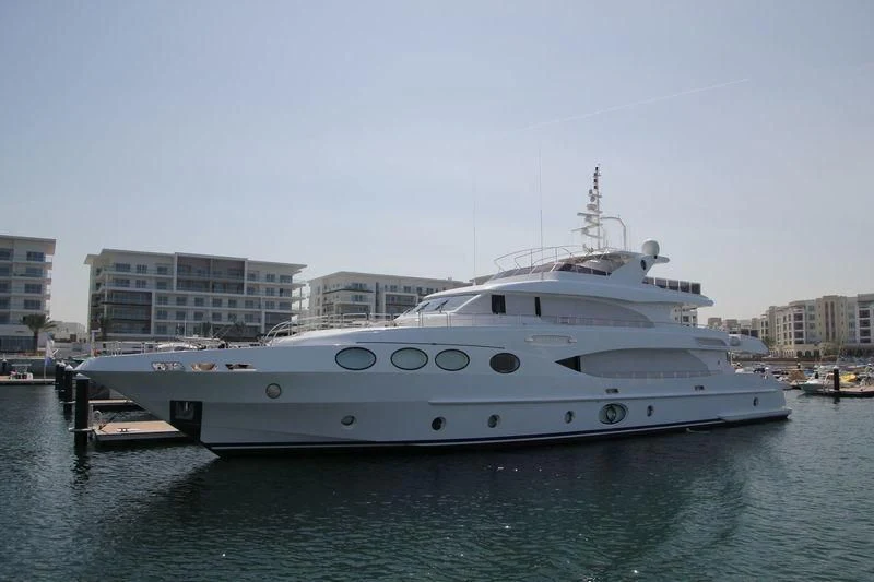 a white yacht in the water aboard OCTOBER Yacht for Sale