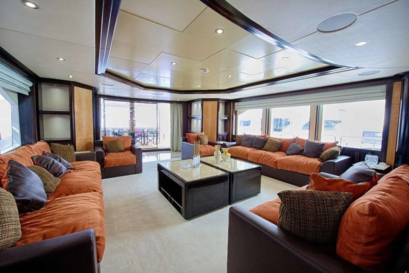 a living room with a large window aboard OCTOBER Yacht for Sale