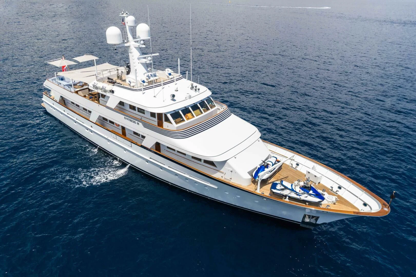 a boat in the water aboard SYNTHESIS 66 Yacht for Sale