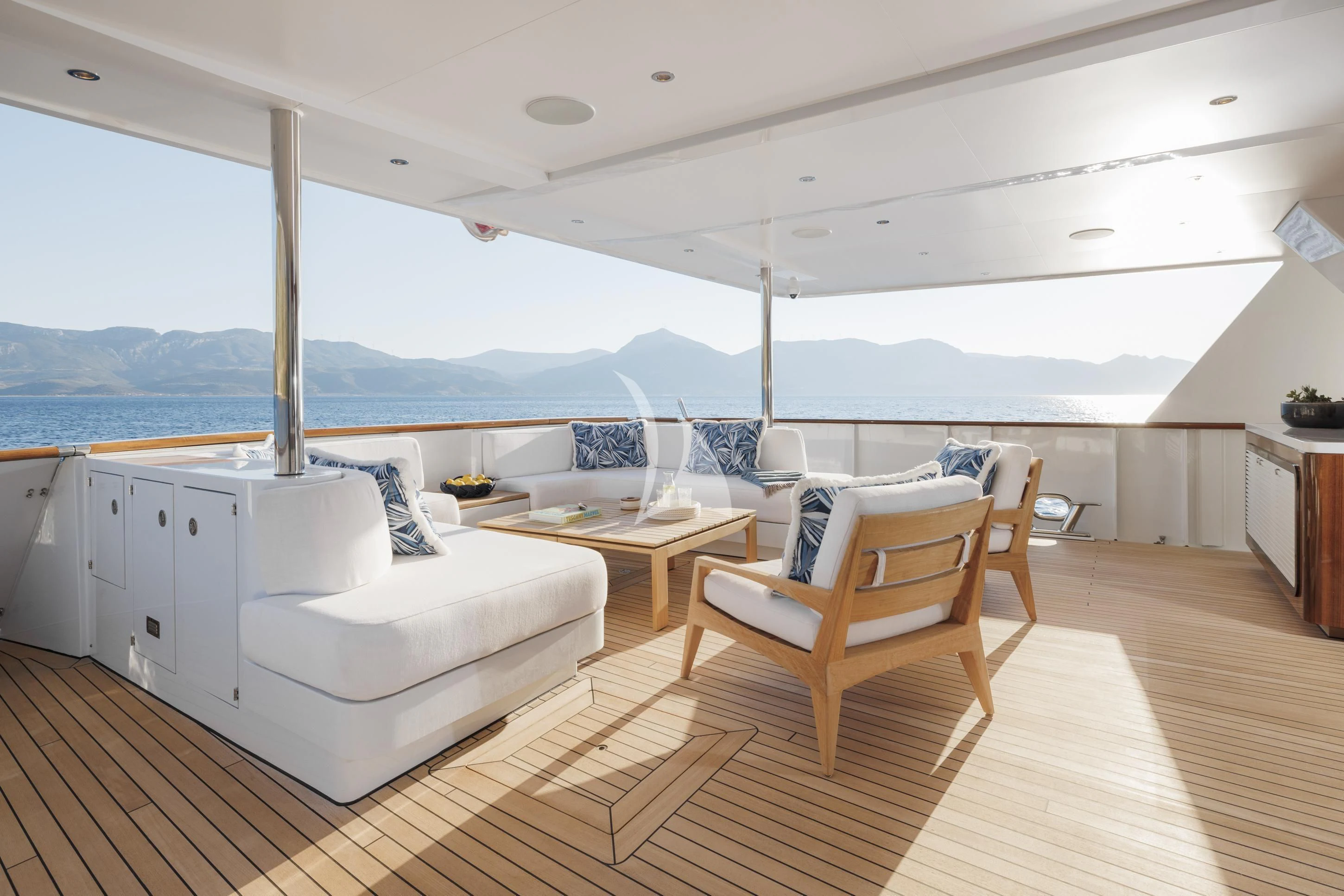 a living room with a large window aboard SYNTHESIS 66 Yacht for Sale