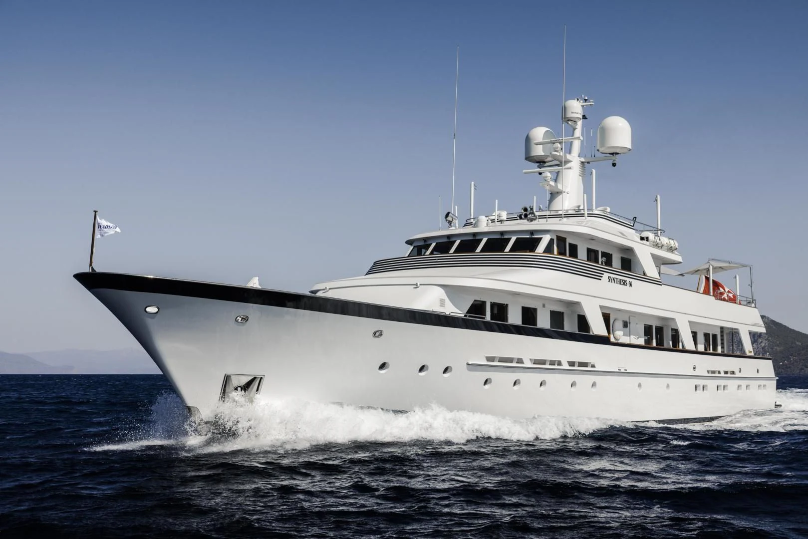 a large white ship aboard SYNTHESIS 66 Yacht for Sale