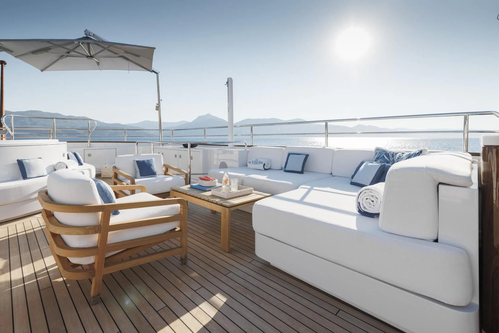 a deck with a view of the ocean and a deck aboard SYNTHESIS 66 Yacht for Sale