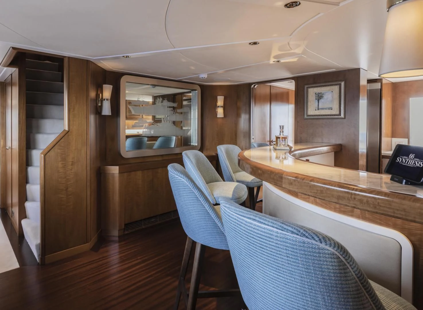 a room with a table chairs and a laptop aboard SYNTHESIS 66 Yacht for Sale