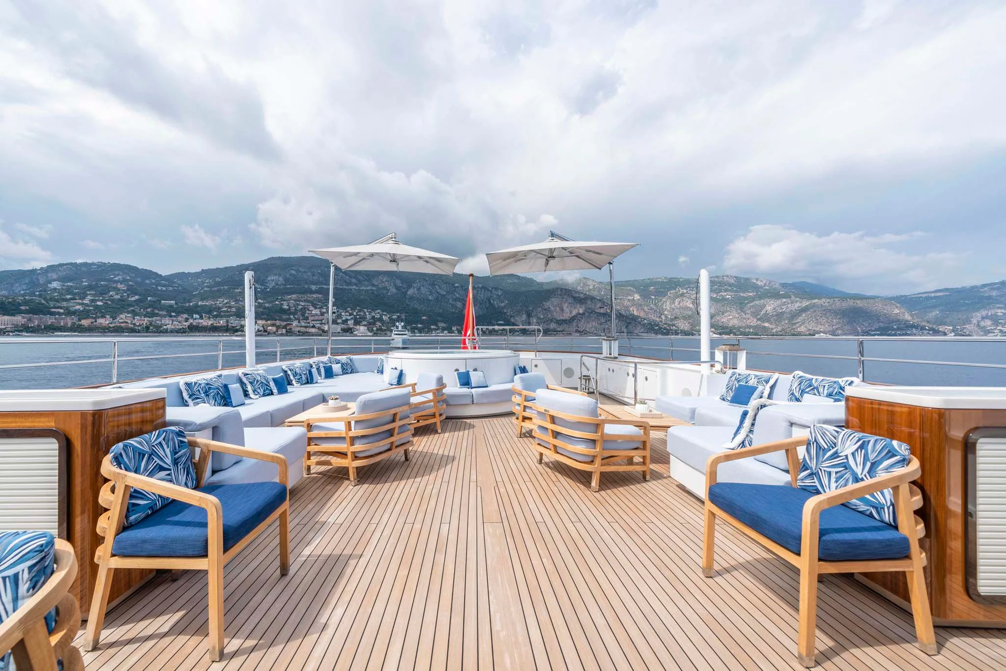a deck with chairs on it aboard SYNTHESIS 66 Yacht for Sale