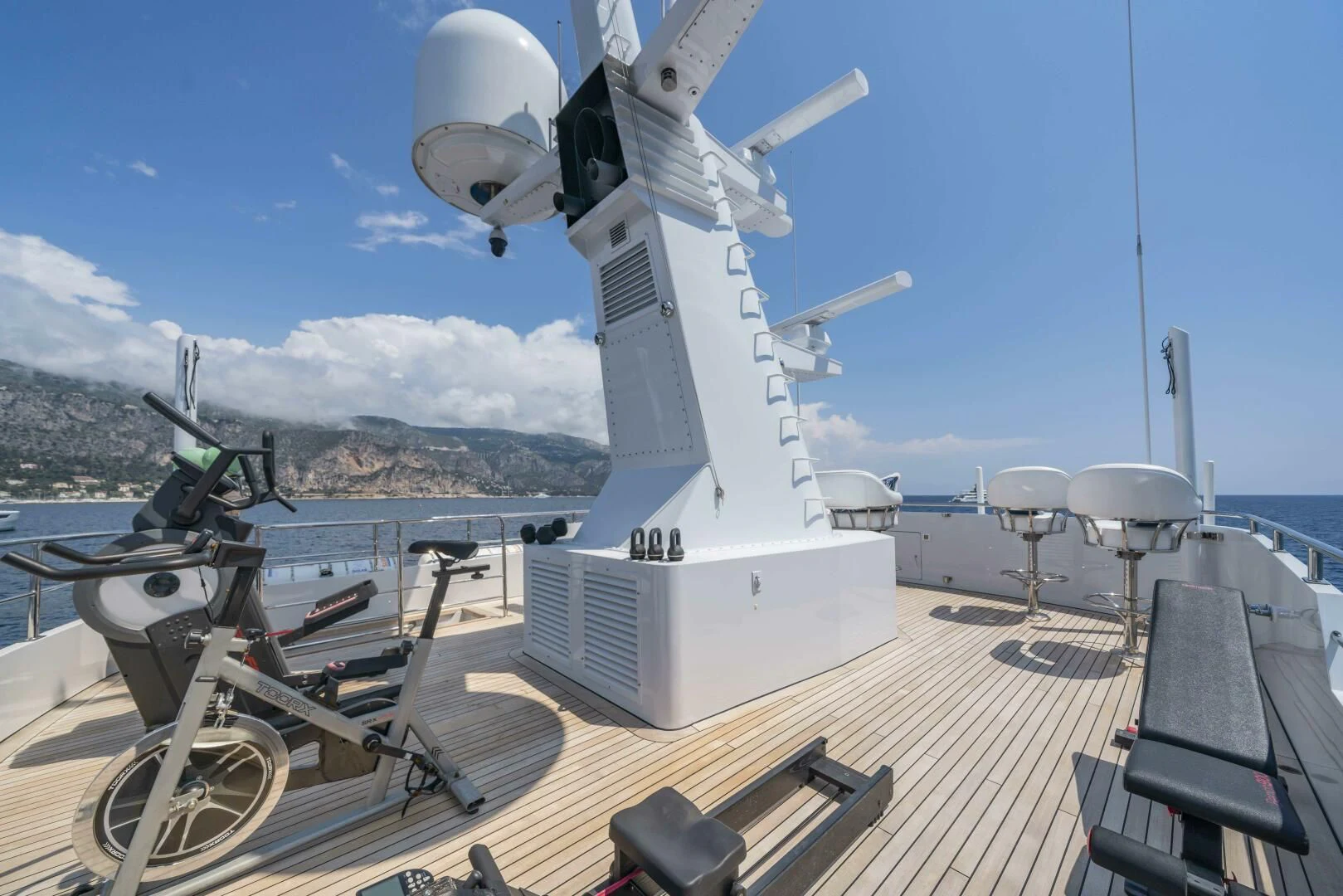 a large white satellite dish on a deck aboard SYNTHESIS 66 Yacht for Sale