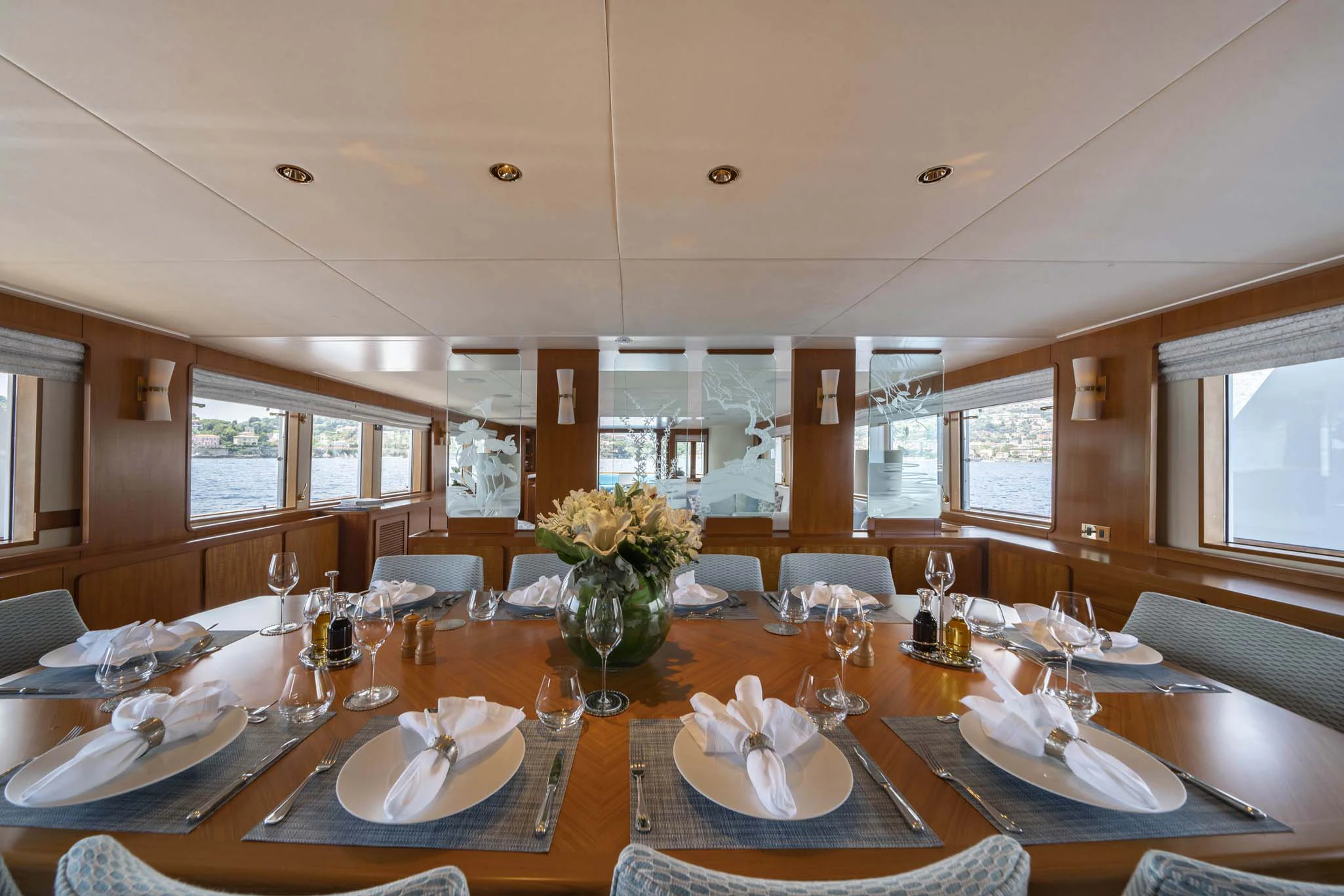 a large dining room table aboard SYNTHESIS 66 Yacht for Sale