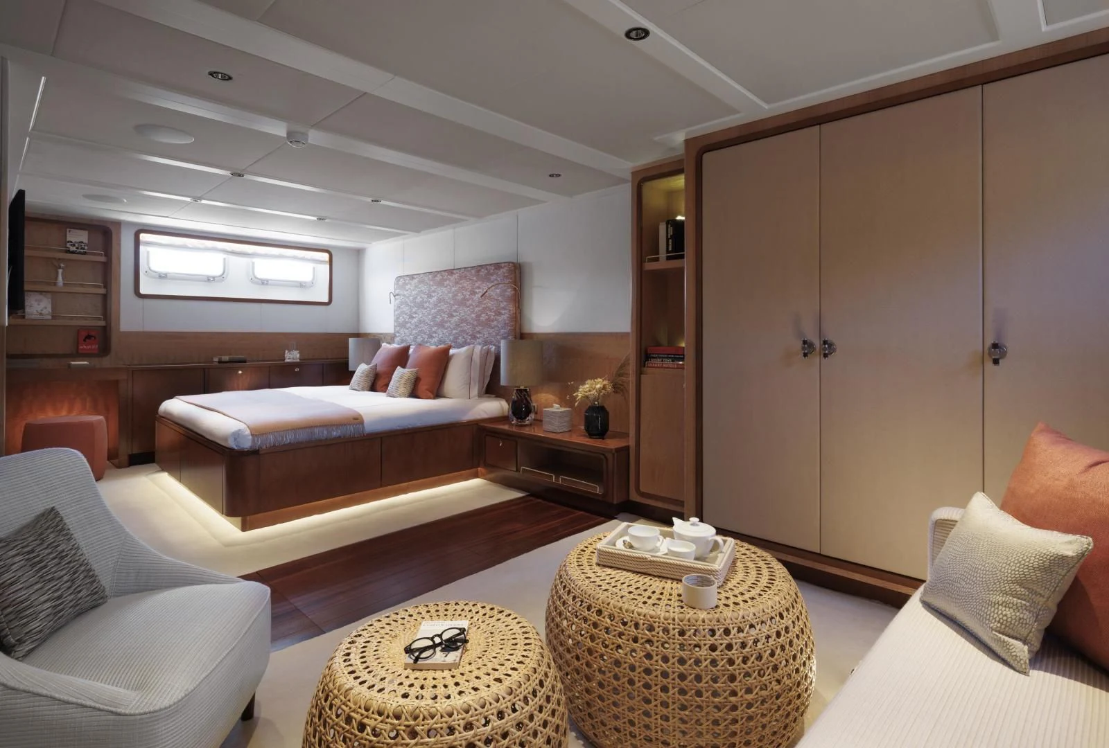 a living room with a couch and a table aboard SYNTHESIS 66 Yacht for Sale