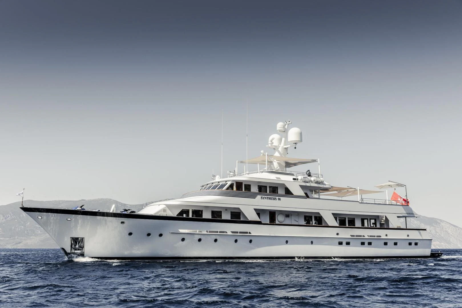 a large white yacht in the water aboard SYNTHESIS 66 Yacht for Sale