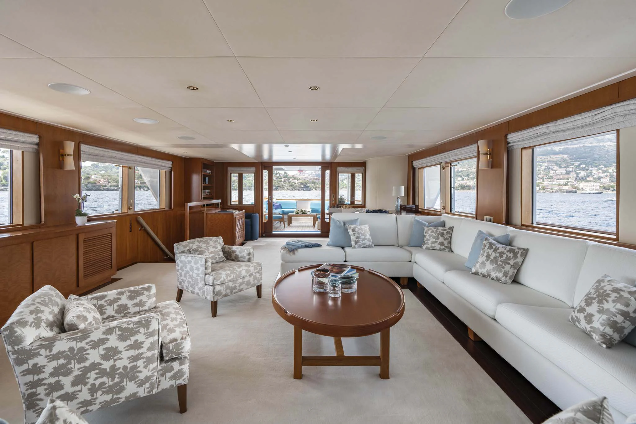 a living room with a large window aboard SYNTHESIS 66 Yacht for Sale