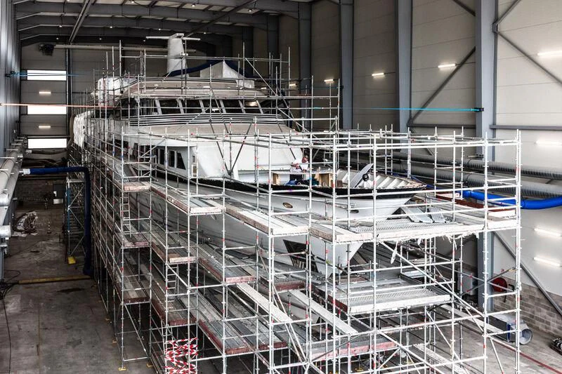 a large white machine with wires aboard SYNTHESIS 66 Yacht for Sale