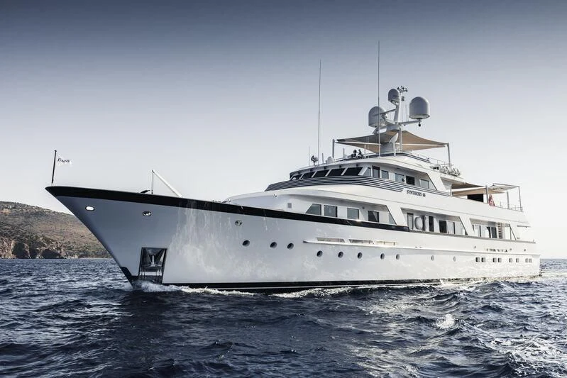 a large white boat in the water aboard SYNTHESIS 66 Yacht for Sale