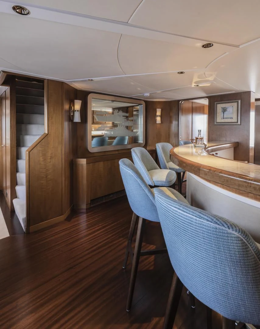 a kitchen with a dining area aboard SYNTHESIS 66 Yacht for Sale