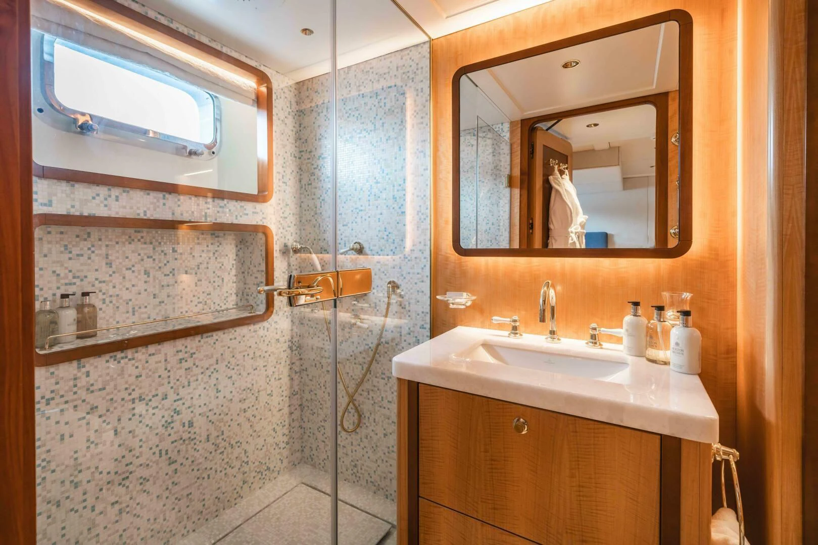 a bathroom with a shower and sink aboard SYNTHESIS 66 Yacht for Sale
