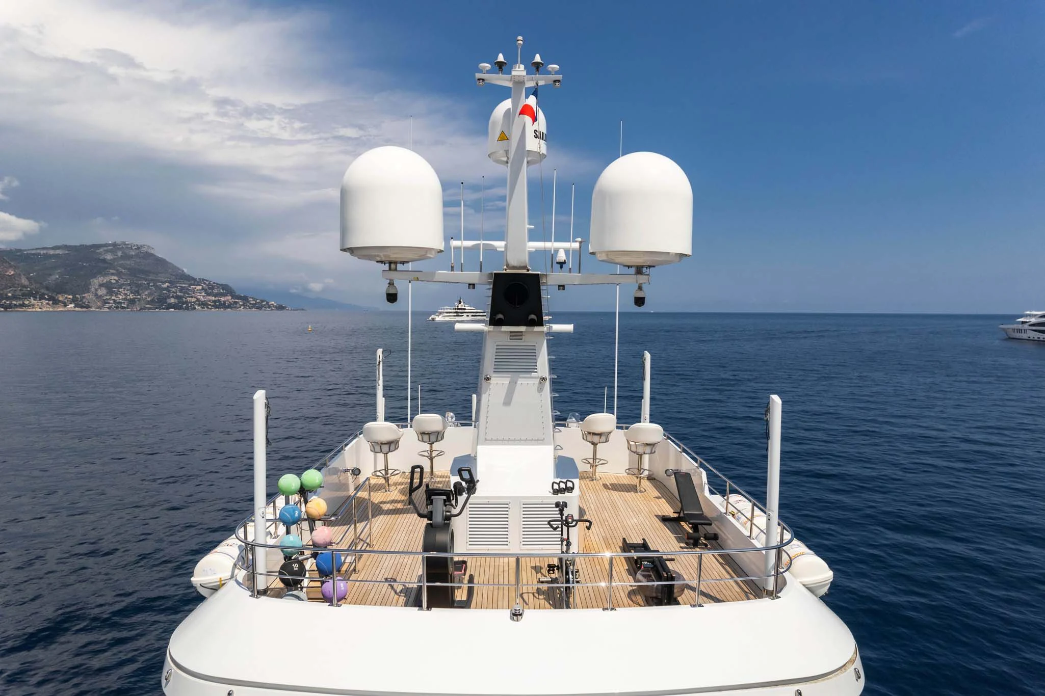 a boat with a group of people on it in the water aboard SYNTHESIS 66 Yacht for Sale