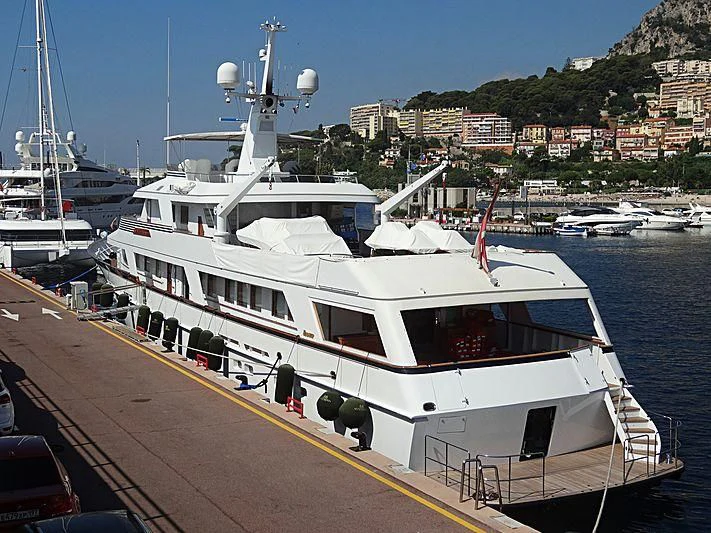 a boat docked at a pier aboard SYNTHESIS 66 Yacht for Sale