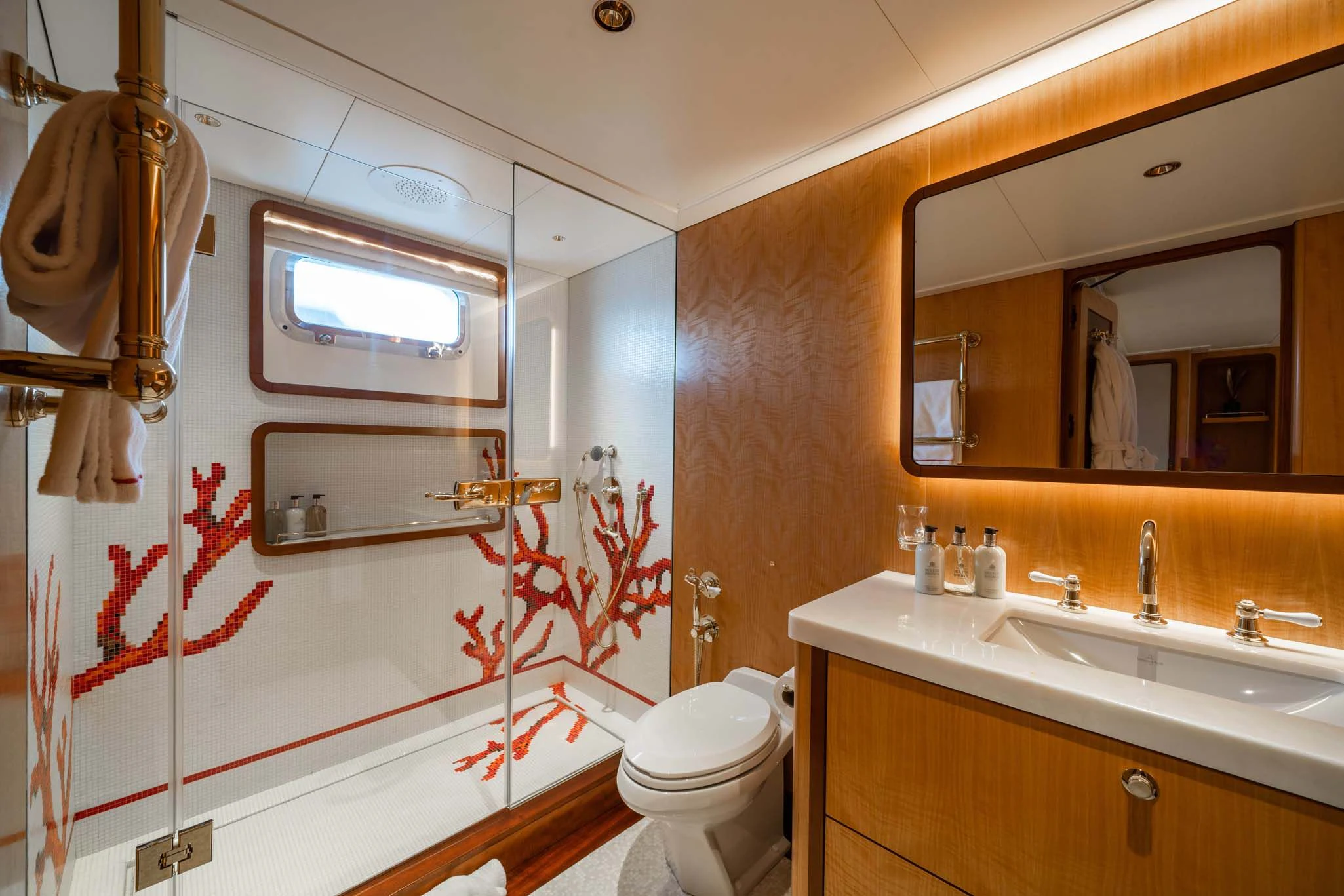 a bathroom with a shower curtain aboard SYNTHESIS 66 Yacht for Sale