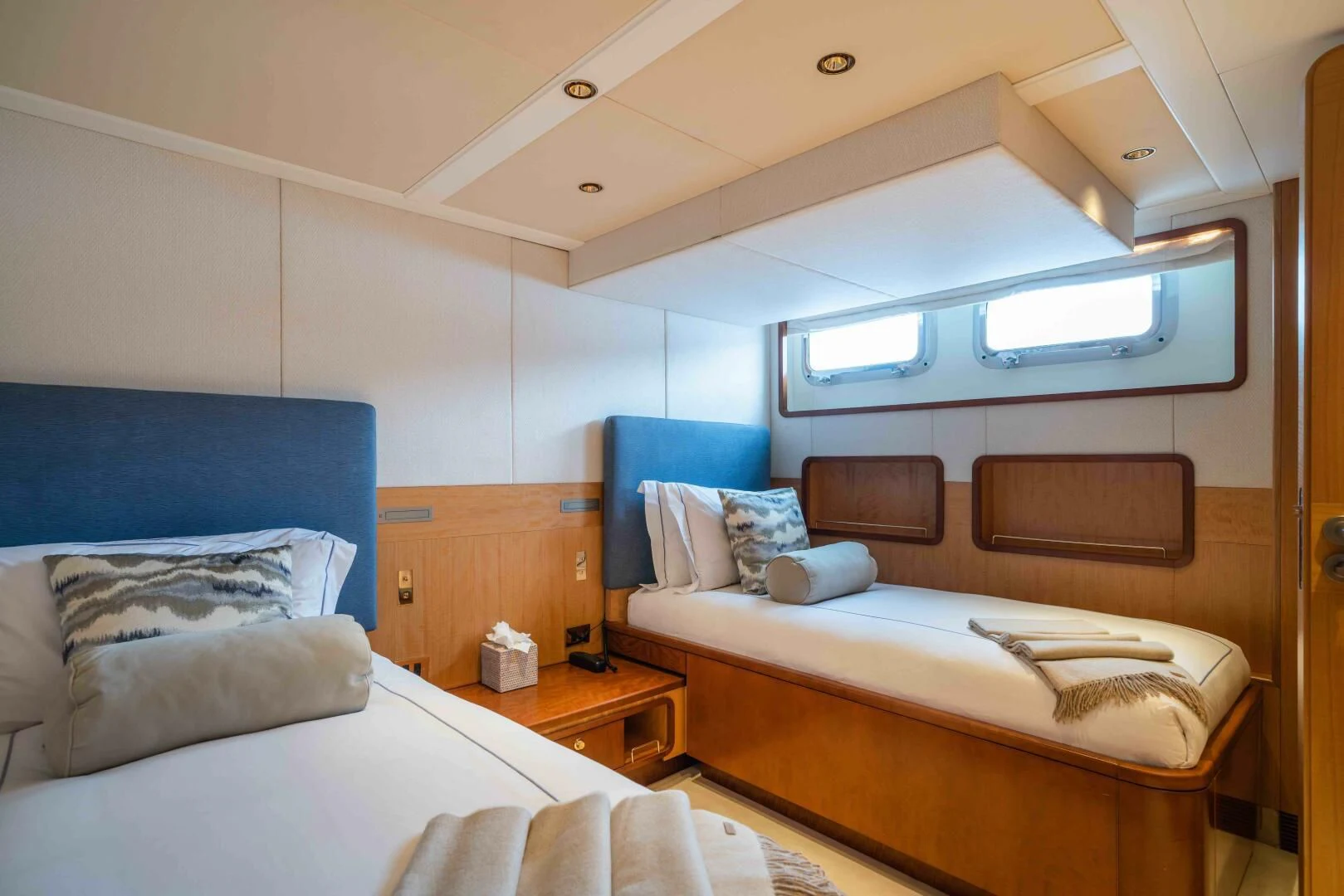 a room with two beds aboard SYNTHESIS 66 Yacht for Sale