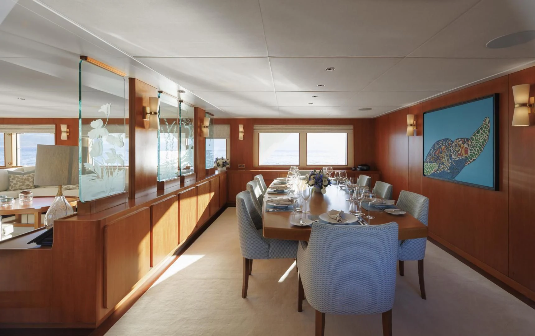 a dining room with a table aboard SYNTHESIS 66 Yacht for Sale