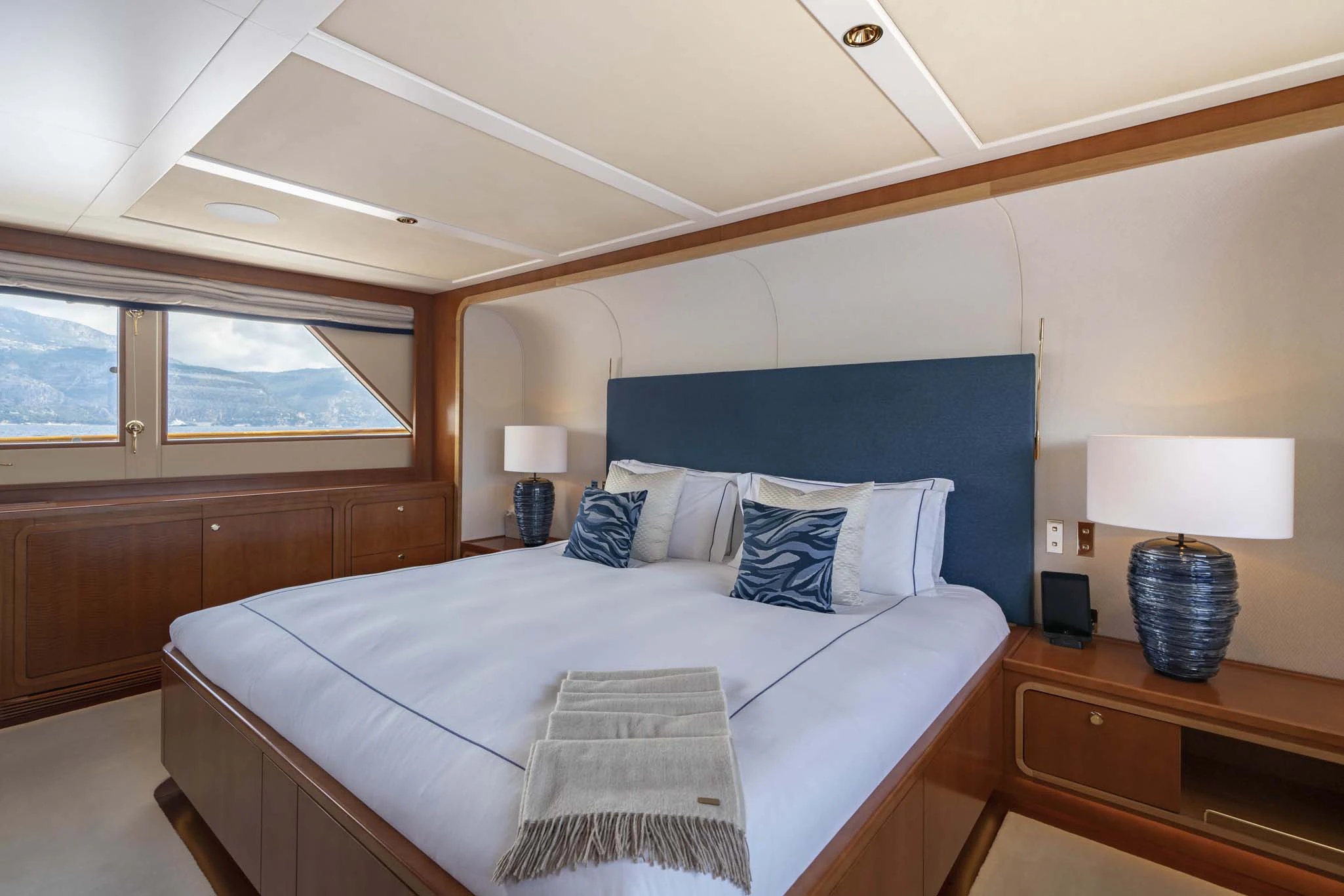 a bed in a room aboard SYNTHESIS 66 Yacht for Sale