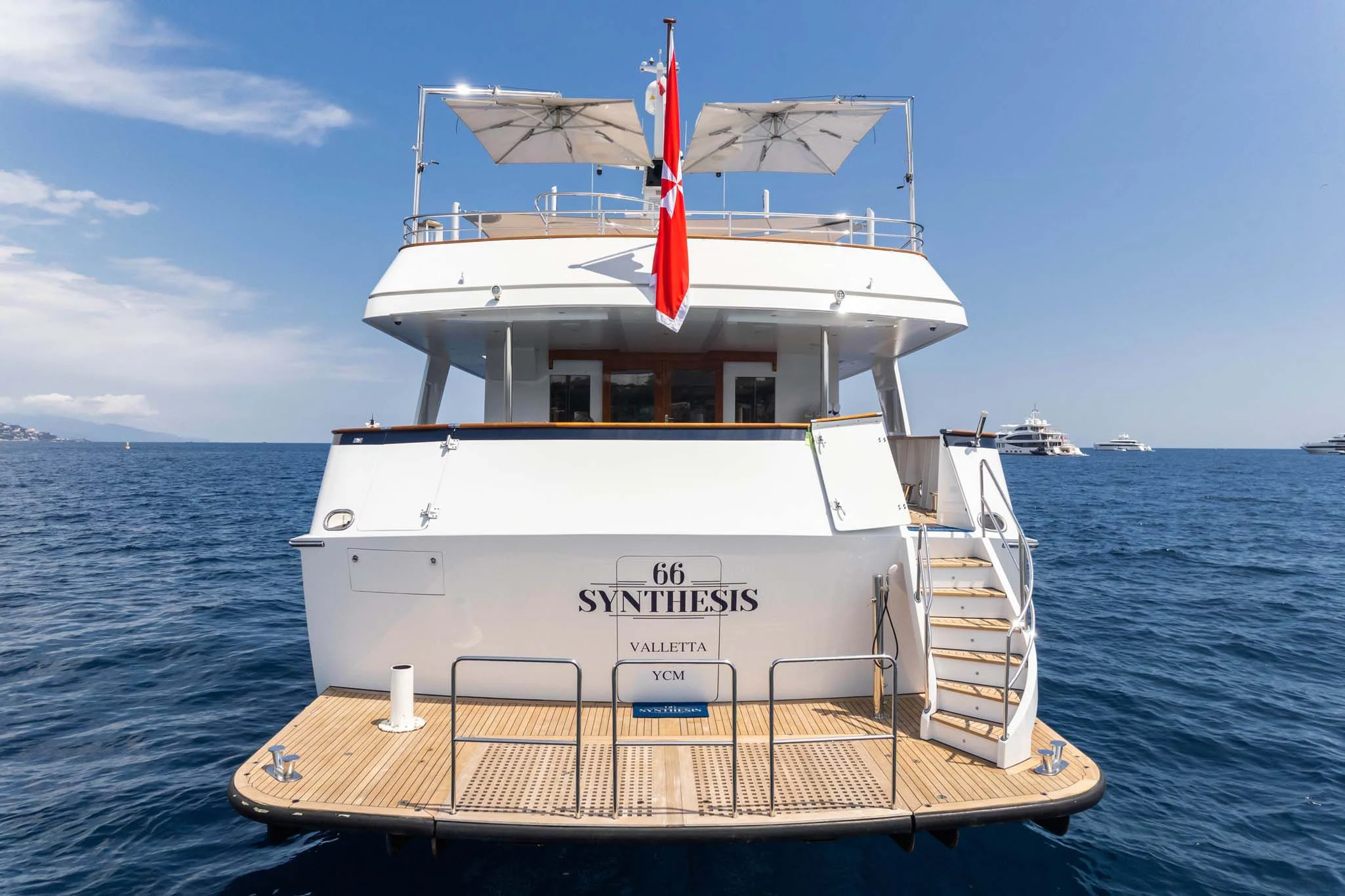 a boat on the water aboard SYNTHESIS 66 Yacht for Sale