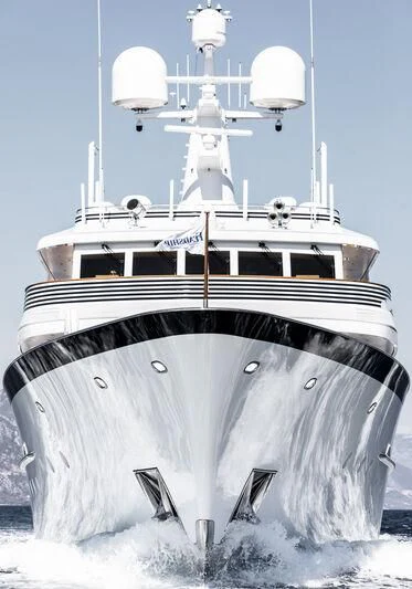 a large white boat with a white ship in the water aboard SYNTHESIS 66 Yacht for Sale