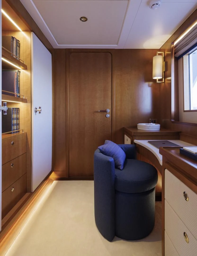 a chair in a room aboard SYNTHESIS 66 Yacht for Sale