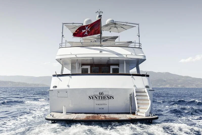 a boat on the water aboard SYNTHESIS 66 Yacht for Sale