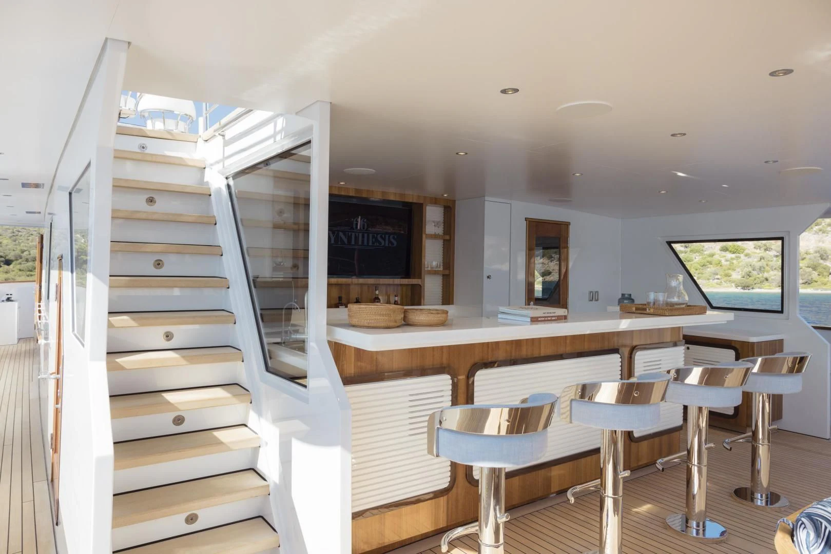 a room with a bunk bed and desks aboard SYNTHESIS 66 Yacht for Sale