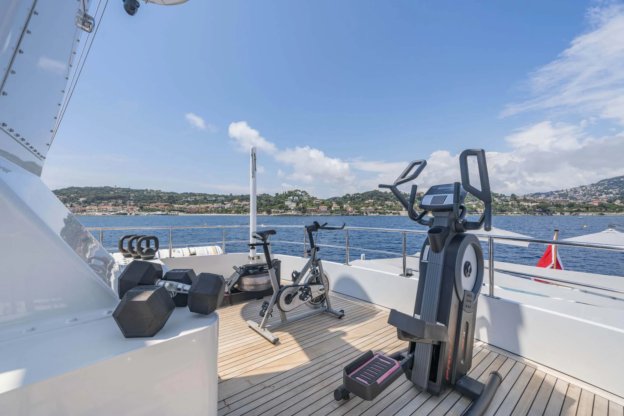 a boat with a bicycle on the front aboard SYNTHESIS 66 Yacht for Sale