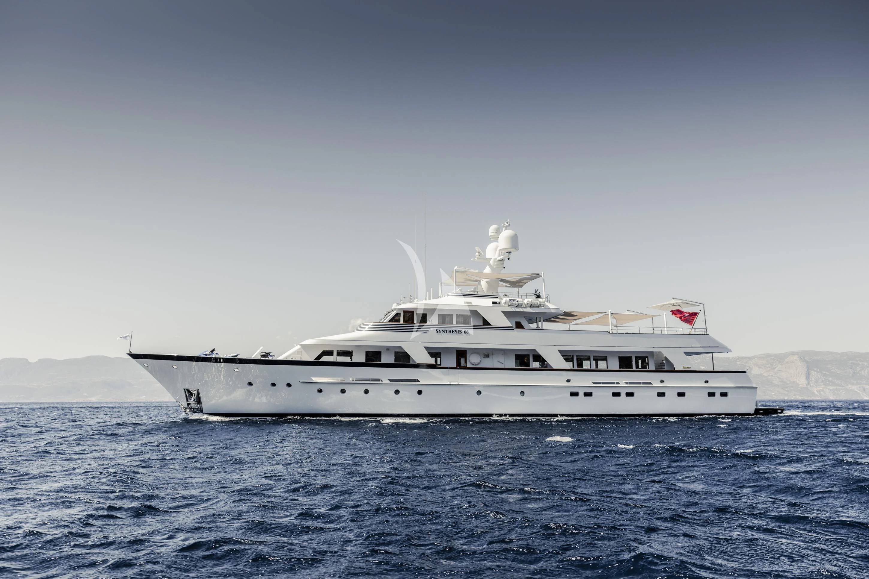 a white yacht in the water aboard SYNTHESIS 66 Yacht for Sale