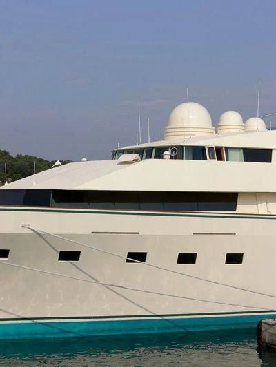 a white yacht in the water aboard KINGDOM 5KR Yacht for Sale