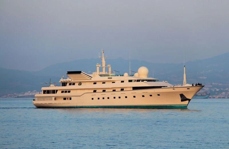 a large ship in the water aboard KINGDOM 5KR Yacht for Sale