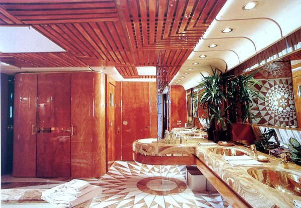 a room with a red door aboard KINGDOM 5KR Yacht for Sale