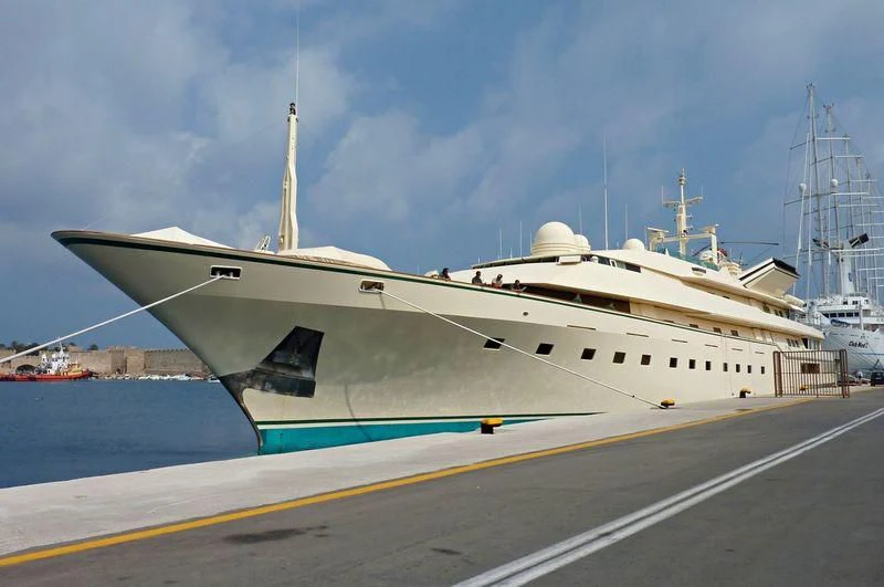 a large white ship aboard KINGDOM 5KR Yacht for Sale