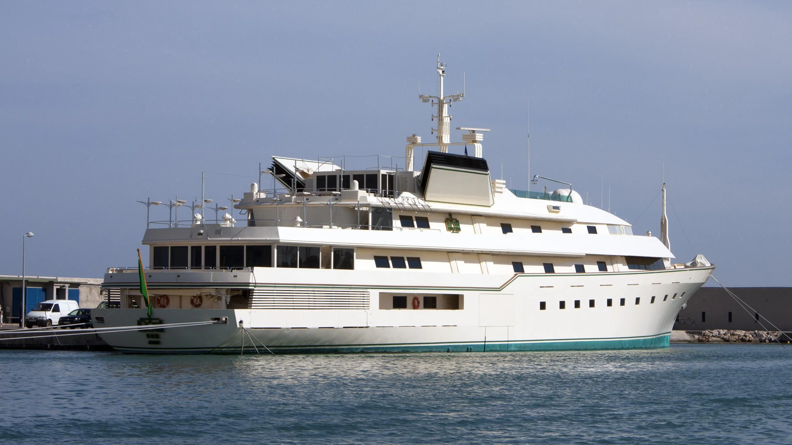 a large white ship aboard KINGDOM 5KR Yacht for Sale