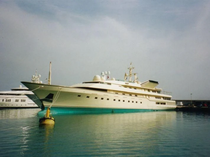 a large white ship in the water aboard KINGDOM 5KR Yacht for Sale